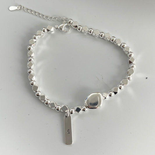 Uneven Beaded Sterling Silver bracelet